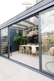 Moderne Schwarze Alu Uberdachung Terrasse Schiebeturen Profiline Gartenzimmer Kaltwinterg Kaltwintergarten Hinterhof Terrassen Designs Uberdachung Terrasse