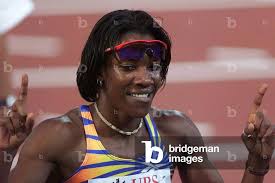 Image of KIM BATEN WINS 400 METRES RACE AT ATHLETICS MEETING IN