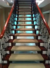 Stair Carpet Runners For Open Back Stairs Stair Runner Carpet Carpet Stairs Stair Runner An open tread black oak staircase with steel rail & glass balustrade.