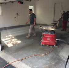 Epoxying the floor traps all the dust and seals the floor. Garage Floor Coatings