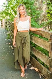 As a beginner's rule, wide leg trousers look better in darker shades such as charcoal, navy and black and earthen neutrals such as camel, beige and stone. Grassland Wrap Pants Wrap Pants Crop Top Outfits Summer Flowy Summer Pants