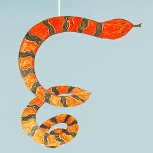To draw a snake, start by making a circle for the head. Paper Spiral Snake Kids Crafts Fun Craft Ideas Firstpalette Com