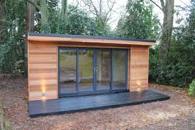 11 Affordable Garden Houses Made From Old Shipping Containers Summer House Interiors Summer House Garden Garden Cabins