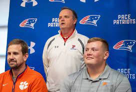 Patriots's football offensive lineman signs with Clemson University