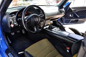 The ap2 added larger wheels and a mild facelift for the body, while the suspension was further refined and the engine enlarged to 2.2 liters, bringing more peak torque and a broader torque curve, as well as a lower redline on its digital tach. 2008 Honda S2000 Cr Review Rnr Automotive Blog