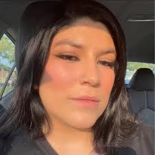 Looking for tattoo artist to cover up thin cursive writing