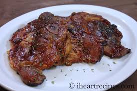 Place the pork chops on a greased baking tray and put them in the center of the oven. Oven Baked Barbecue Pork Chops I Heart Recipes