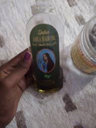 L Huile D Amla Sur Cheveux Crepus Frises Ou Boucles Nybeauty Care Cheveux Crepus Huile Amla Crepus