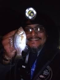 His first catfish. B-Fishing.