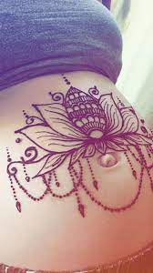 Looking for henna tattoo ideas? Henna Tattoo Pregnant Lotus Flower Belly Henna Belly Tattoos Henna Tattoo Belly Henna