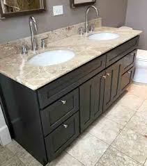 Make a dated bathroom vanity look new again with a paint job and some elbow grease. Modern Dark Painted Bathroom Vanity Over Easy Kitchens