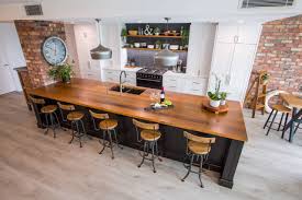 The black walls and kitchen island are black valchromat, a wood fiber based material that is a solid color throughout — what does that mean exactly? 75 Beautiful Rustic Kitchen With Black Cabinets Pictures Ideas June 2021 Houzz