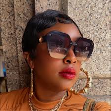 Tasha K calls out the retired NFL star for allegedly entertaining a  20-year-old “white child” and said this drama wouldn't exist if he was  “married and sleeping with mature women like Denzel