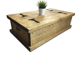 The farmhouse trunk coffee table comes in a white distressed finish and dark top. Solid Rustic Handmade Pine Coffee Table Chest Finished In A Chunky Country Oak 100 X 60 X 33cm Medium Oak Buy Online In Angola At Angola Desertcart Com Productid 68755722