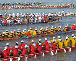 Colorful longboats on the river during the Water Festival.