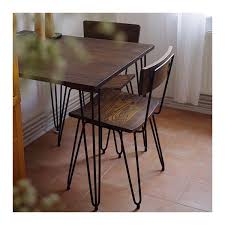 Each piece is made from metal with engineered wood surface details. Black Dining Room Set Wild Country Fine Arts