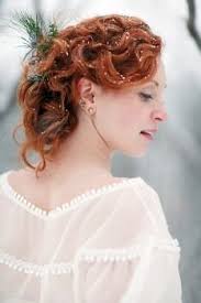 Ellen and Colin's Minnesota Wedding, with a handmade canoe, a homemade  wedding dress and lots of snow.