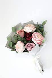 Make your own bouquet of beautiful paper flowers. Paper Flower Bouquet Handmade By Sara Kim Paper Flower Bouquet Diy Flower Bouquet Diy Paper Flower Bouquet