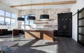 Stainless steel appliances bring a professional industrial look without loosing character. How To Design An Industrial Farmhouse Kitchen Cambridge Home