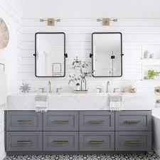 It features classy, wooden cabinets which ideally match earthy tiles on the wall and floor. 24 Double Vanity Ideas To Try In Your Bathroom