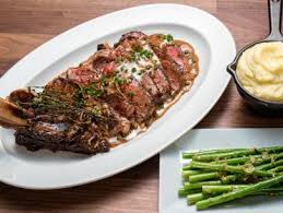 Reverse searing the beef browns the outside while leaving the inside tender, juicy, and perfectly cooked. Reverse Sear Ribeye Steak Reloaded Recipe Alton Brown Cooking Channel