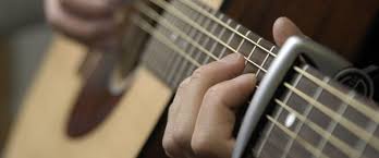 Only the pitch of the open, unfretted strings. How To Find New Interesting Guitar Chords Using A Capo