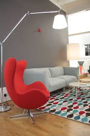 Easter egg chair is a classic furniture design. A Bright Red Egg Chair From Fritzhansen Paired With The Copla Sofa By Sancal On A Ga Dining Room Chairs Ikea Chair Decorations Outdoor Lounge Chair Cushions