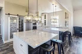 L Shaped Kitchen With Two Islands White Countertops Cabinets