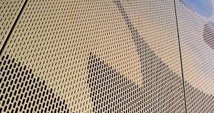 Rmig Perforated Aluminium Panels Gold Finish Maison Du Portugal Blech Fassade Metallfassade Fassade
