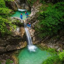 Canyoning In Fratarica Natural Gem One Of A Kind Bovec Slovenia Natural Water Slide Slovenia Rappelling