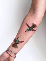 With its wings in the air, it appears to be in flight, but luckily this bird will be a permanent fixture on this person's forearm. Pin On Tattoo