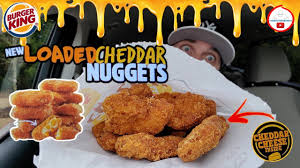 Burger king is one of america's favorite fast food restaurants; Burger King Is Rolling Out Chicken Nuggets That Are Filled With Cheddar Cheese