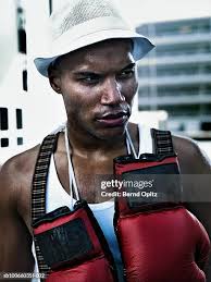 31 Boxing Gloves Around Neck Stock Photos, High-Res Pictures, and Images