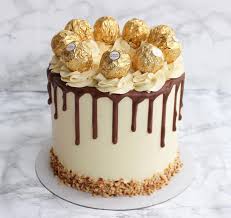Hello There Ferrero Rocher Cake Dripcake Ferrerorocher Ferrerorochercake Chocolatedrip Hazelnutcake Occasio In 2020 Savoury Cake Cake Creative Cake Decorating