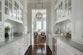 2 bdrms & a picture perfect full bath w/ soaker style tub complete the main floor. Galley Style Butler Pantry Design Transitional Kitchen