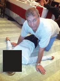 Latest Epstein files show ex-prince Andrew Mountbatten-Windsor on all  fours, kneeling over woman | RNZ News