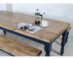 Catching the attention with its raw, natural design. Farmhouse Dining Table With Reclaimed Wood Top Made In The Cellar