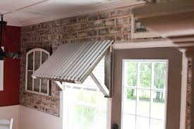 Try using these instructions to build a wood awning over a door and turn your home into the envy of the neighborhood. Corrugated Metal Awning Diy Two Paws Farmhouse