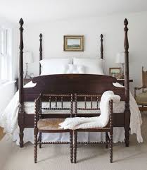 Nailheads detail the upholstered panels. Inside A White Farmhouse All Decked Out For Christmas Traditional Bedroom Country Bedroom Home Bedroom