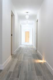 Go bold with striped wallpaper. It S A Long Hallway Design Your Dream House Colorful Tile Floor Interior Design Studio