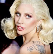 Lady gaga covered her tattoos last night while she performed for the british royal family during the royal variety performance in london, england. Lady Gaga S Tattoos And What They Mean 2021 Celebrity Ink Guide