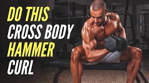 The cross body hammer curl is a poulling isolation strength training exercise. Bicep Workout Do These Single Arm Cross Body Hammer Curl Youtube