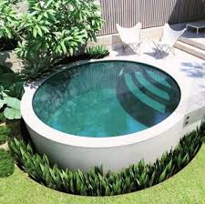 Round Pool With Steps Surrounded With Succulents Small Backyard Pools Round Pool Backyard Pool
