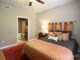 Orange paint and home fabrics, modern wallpaper with orange patterns and small decor accessories create vibrant and optimistic bedroom decor. Apartment Decor Is Orange The New Black Apartmentguide Com