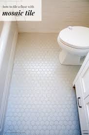 Before you decide what you want where, start setting the tiles, and in the process take some measurements and see how the tiles will all lay out. How To Lay Mosaic Tile Flooring Week 2 One Room Challenge Bathroom Reno With Hexagon Floor Create Enjoy