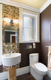 This small bathroom has two functional showers that you can enjoy all at once. Yellow And Brown Bathroom Houzz