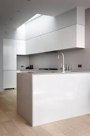 Cornwall Mews Renovation By Alma Nac Centres Around A Cream Staircase Kitchen Interior Design Modern Interior Design Kitchen Minimalist Kitchen Design