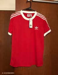 Black And Red Adidas T Shirt Adidas Originals Short Sleeve Ringer Style T Shirt With Elastic Sleeve Cuffs Adidas With Trefoil Insignia All Over Print Red Adidas Original Tees Mens Tops