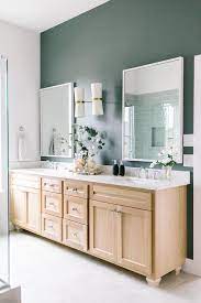 Look for sleek, modern, single sink models, or traditional and elegant. Golden Oak Dual Washstand On Hunter Green Wall Cottage Bathroom