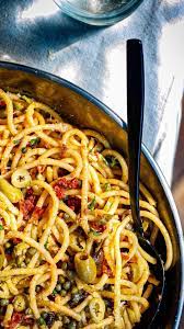 figandoliveplatter on instagram pasta puttanesca the combination of the olives garlic capers anchovy an in 2021 savoury dishes pasta puttanesca sun dried tomato